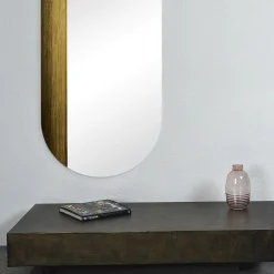Specchio da parete ovale Orizzonte in resina spatolata oro