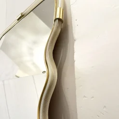 Specchio da parete Torciglione in vetro dorato