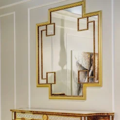Specchio d'oro a forma di croce