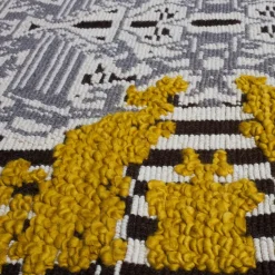 Tappeto giardino giallo a fiori