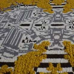 Tappeto giardino giallo a fiori