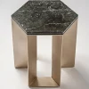 Tavolino Alato in metallo verniciato oro e piano in marmo nero di Antonio Saporito