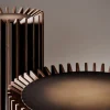 Tavolino Blade in legno canaletto e piano in metallo brunito