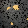 Tavolino da caffè Dalmata in pietra lavica nera a fori aperti e bronzo fuso