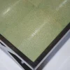 Tavolino in pelle verde zigrino
