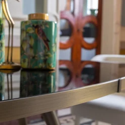 Tavolo da pranzo ellittico Jerome con piano in vetro nero