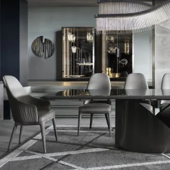 Tavolo da pranzo in pelle grigio trapuntato Mirage con braccioli