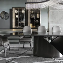 Tavolo da pranzo in pelle grigio trapuntato Mirage con braccioli