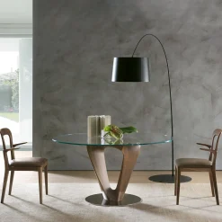 Tavolo da pranzo Mobius in Noce Canaletto con piano in vetro fumé