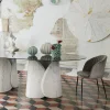 Tavolo da pranzo Petalo in marmo Palissandro con piano in vetro fumé