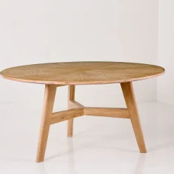 Tavolo da pranzo rotondo con piano in pelle di Michele Bonan