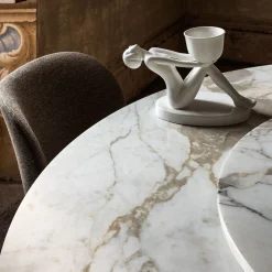 Tavolo da pranzo rotondo Merlino in metallo e marmo di Paolo Rizzatto