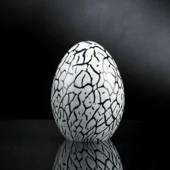 Uovo piccolo di vetro bianco