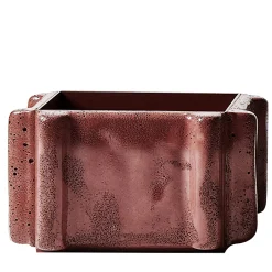 Vaso Riva Basso in cemento rosa di Patricia Urquiola