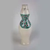 Vaso scultura in ceramica con costume da bagno a pois